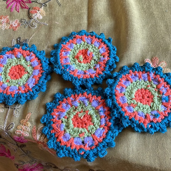 Hand crocheted Mandala coasters in dark teal, orange, violet and green - Picture 3 of 5